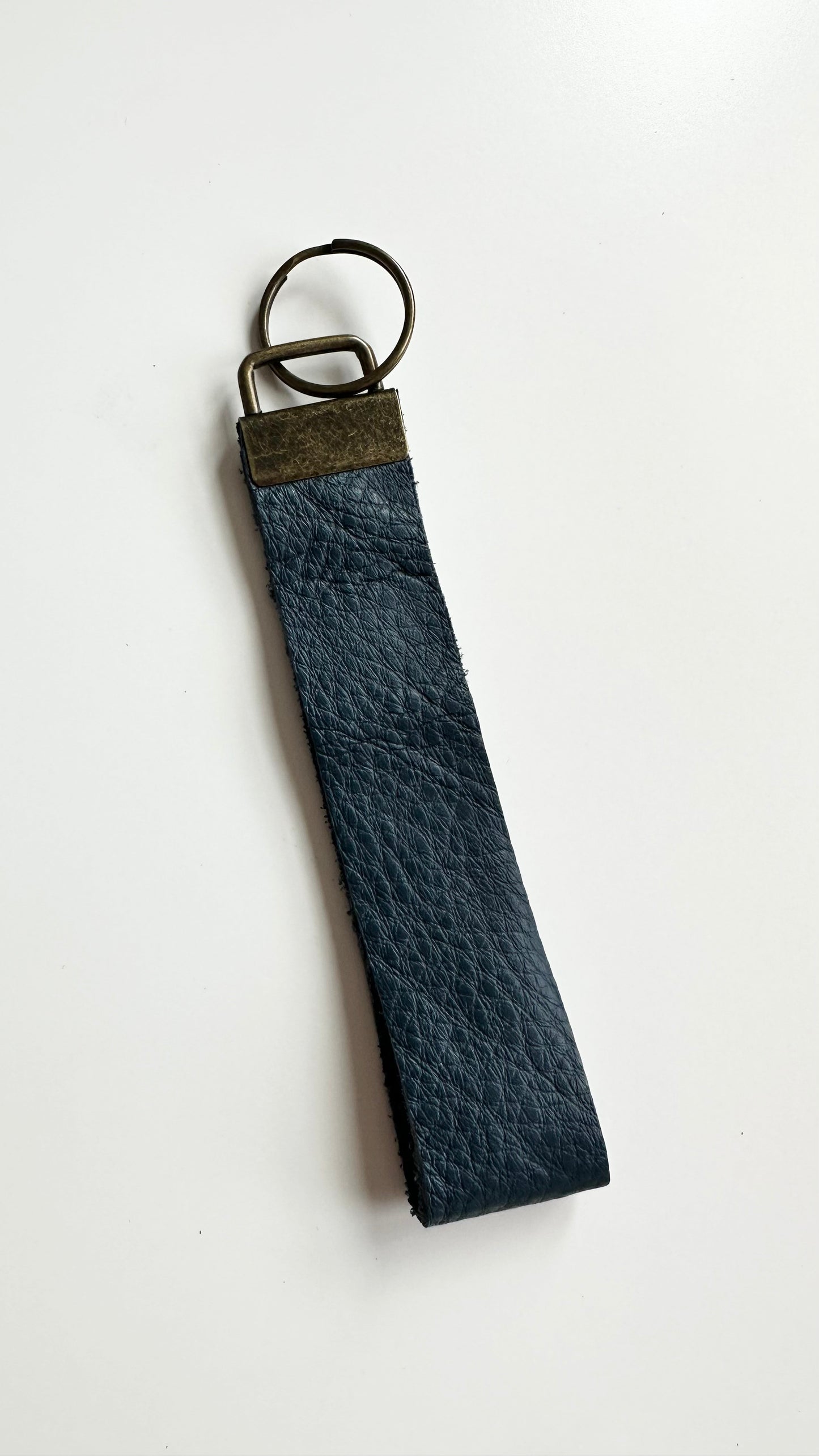 Navy Blue genuine leather wristlet keychain.